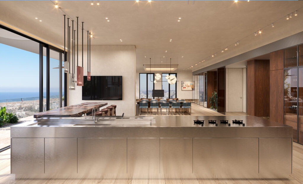 Rendering of an open kitchen with a large island, pendant lights and a dining area beyond.