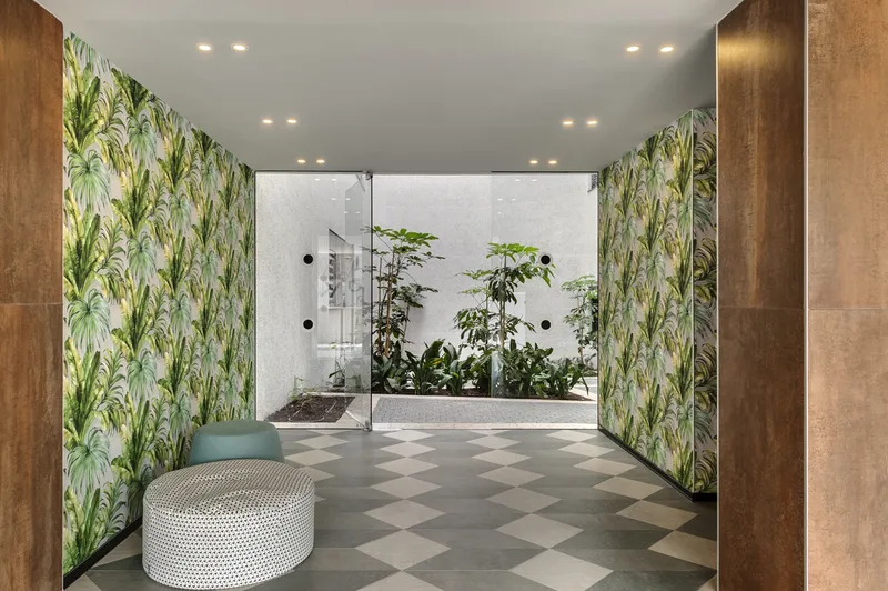 Entrance lobby showing circulation, lighting and interior finishes.