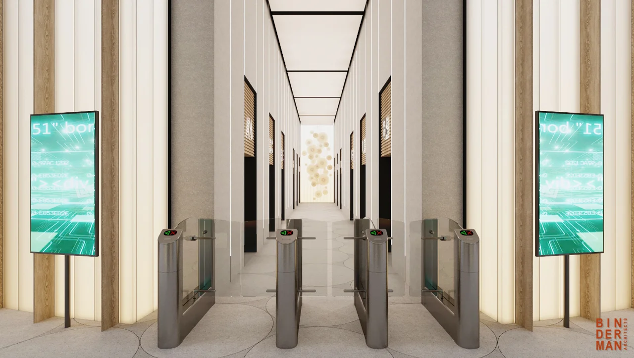 Lift lobby showing lift doors and the surrounding wall and floor finishes.