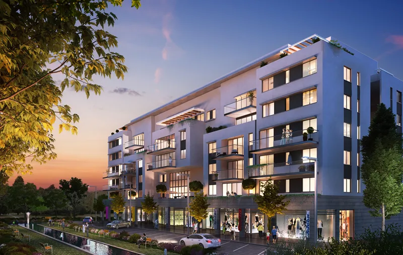 Exterior view of a multi-storey building with windows and balconies.