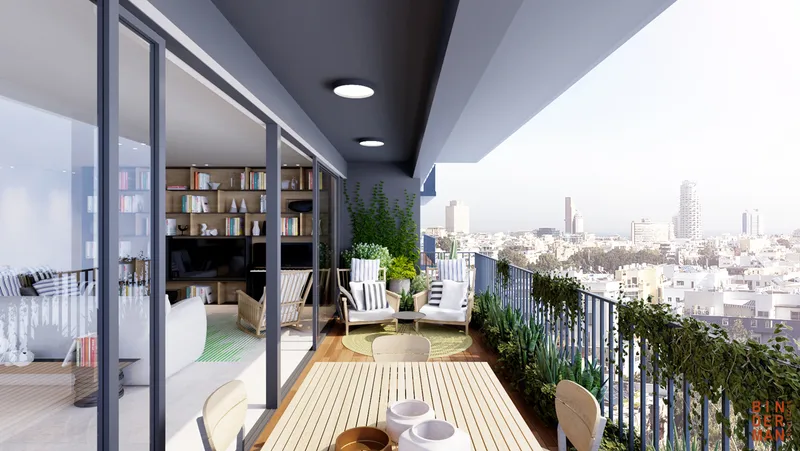 Balcony with outdoor seating overlooking the surroundings.