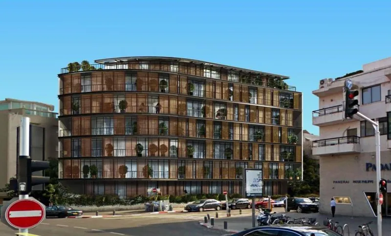 Exterior view of a multi-storey building with windows and balconies.