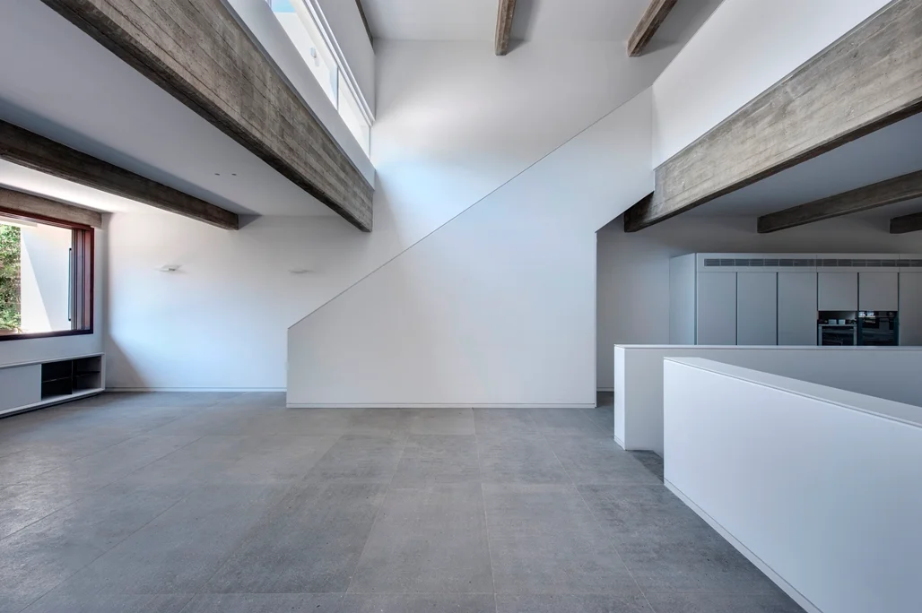 Interior showing the arrangement of walls, openings and structural beams.