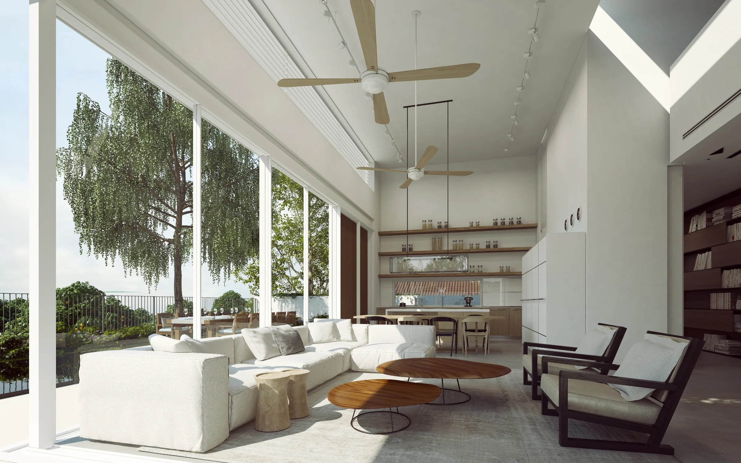 Living room with seating, tables and large windows.