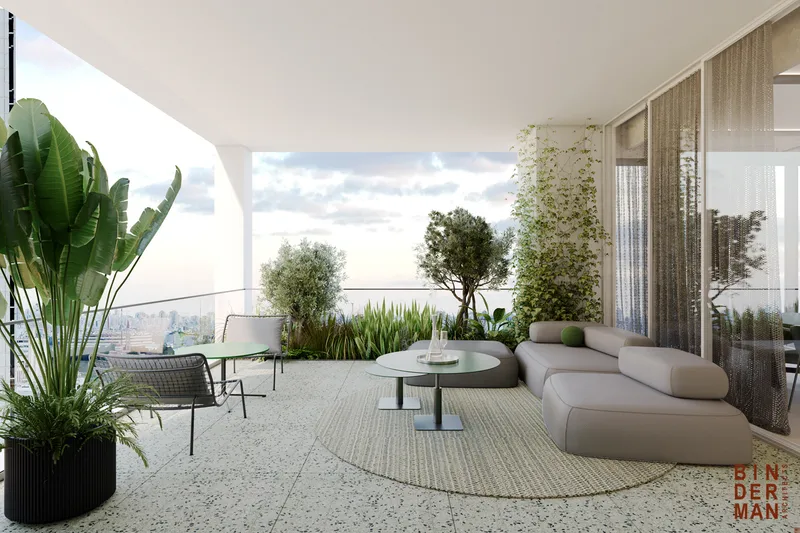 Balcony with outdoor seating overlooking the surroundings.