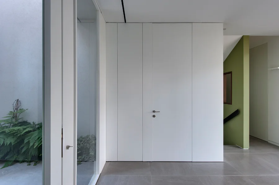 Entrance doorway and the adjoining interior space.