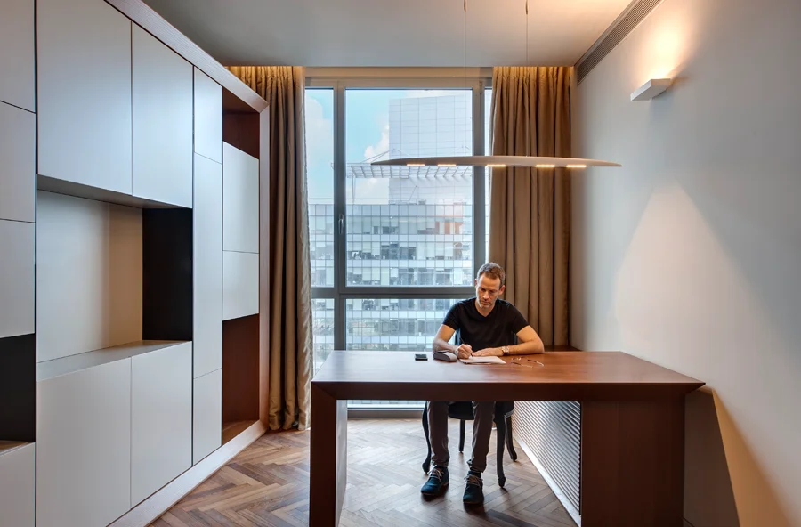 Workspace showing desks, chairs and interior finishes.