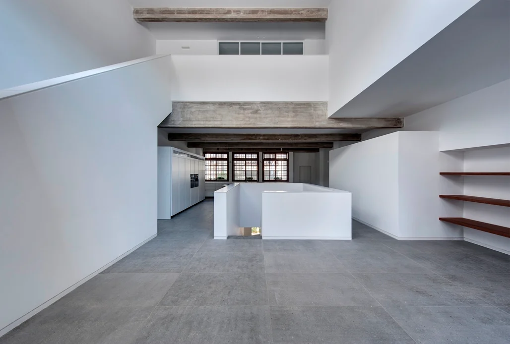 Interior showing the arrangement of walls, openings and structural beams.