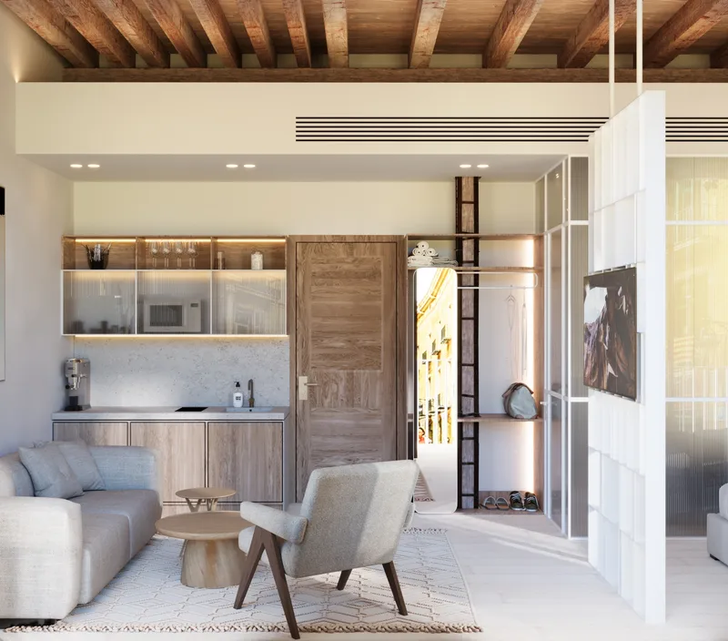 Living room with seating, tables and large windows.