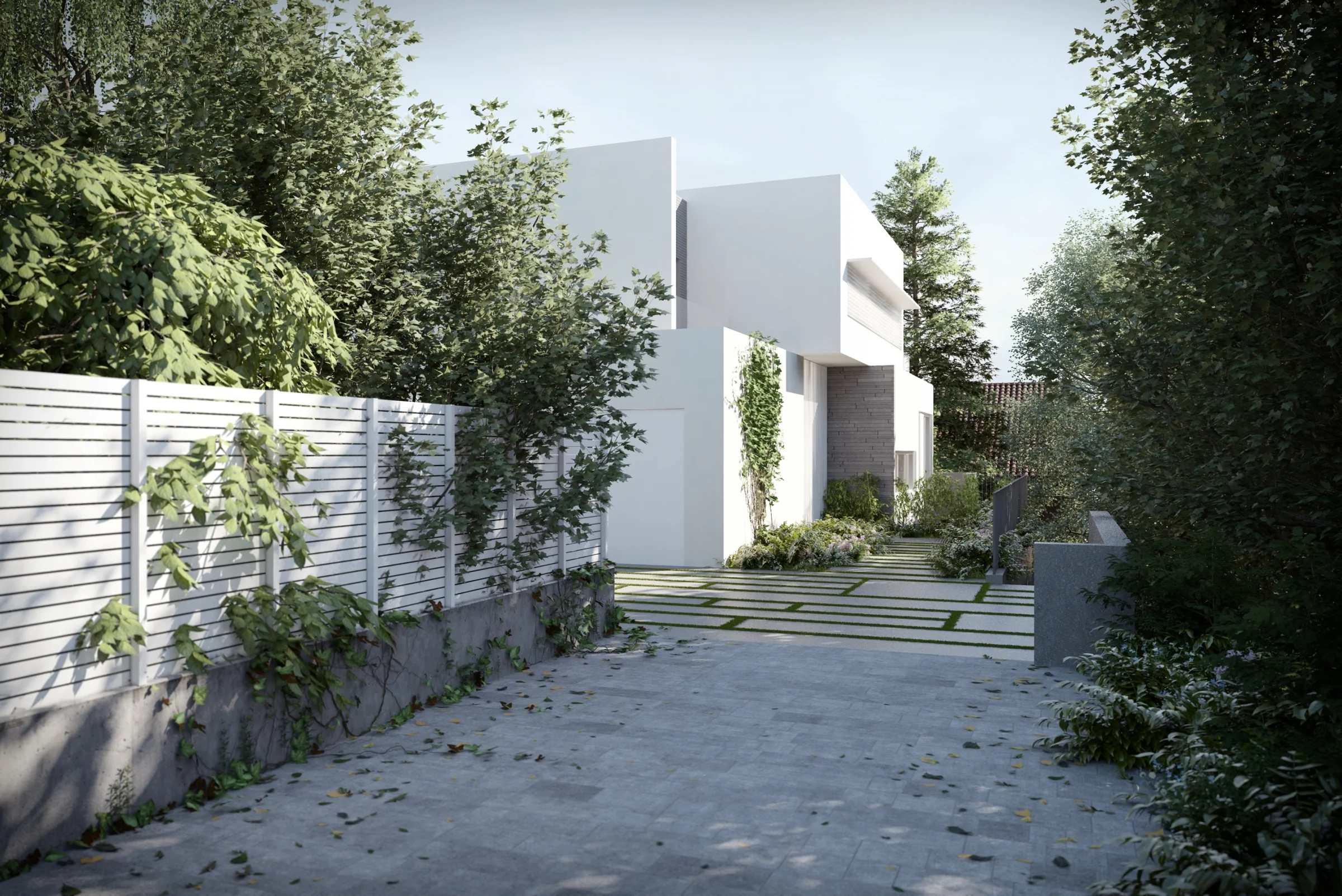 Approach to a house, with paving, planting and exterior walls.