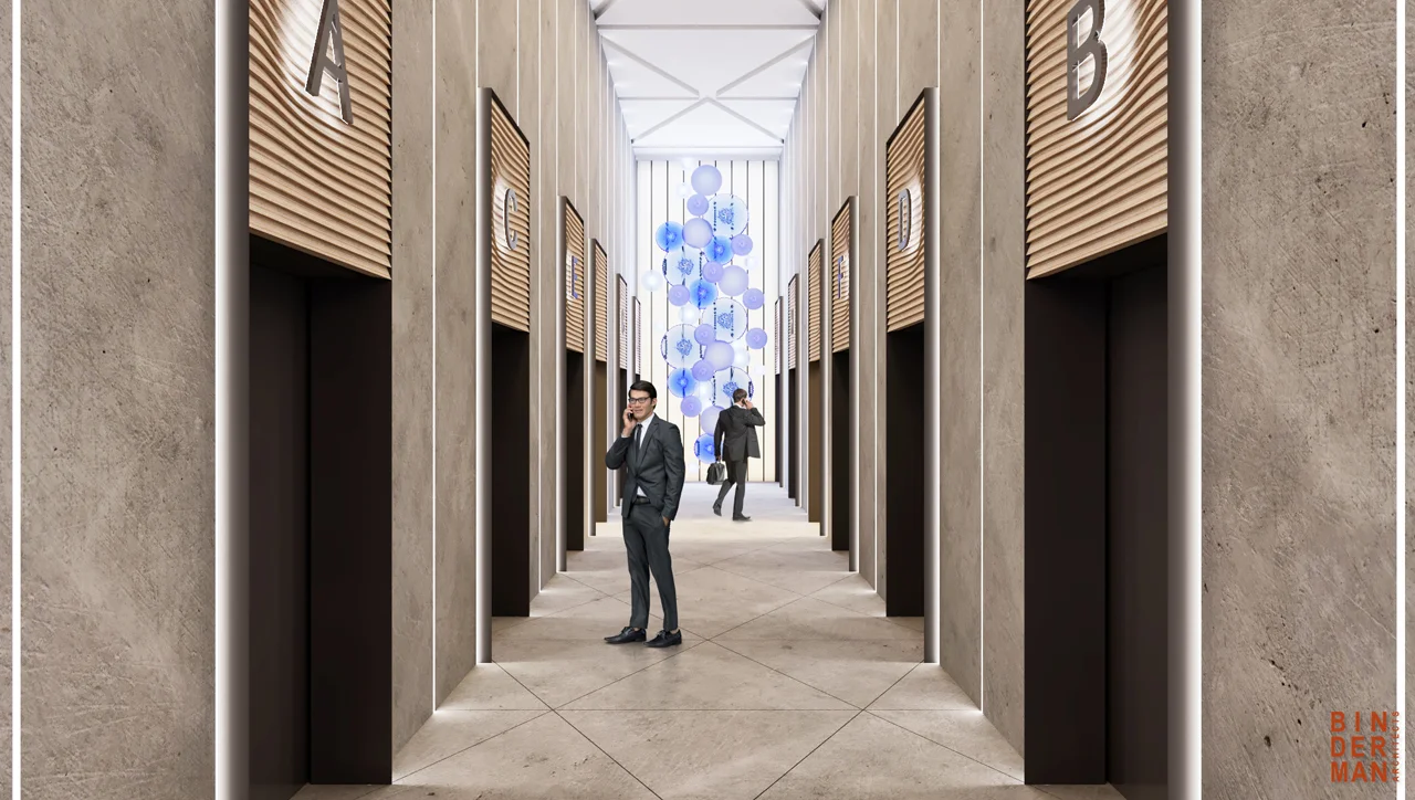 Lift lobby showing lift doors and the surrounding wall and floor finishes.