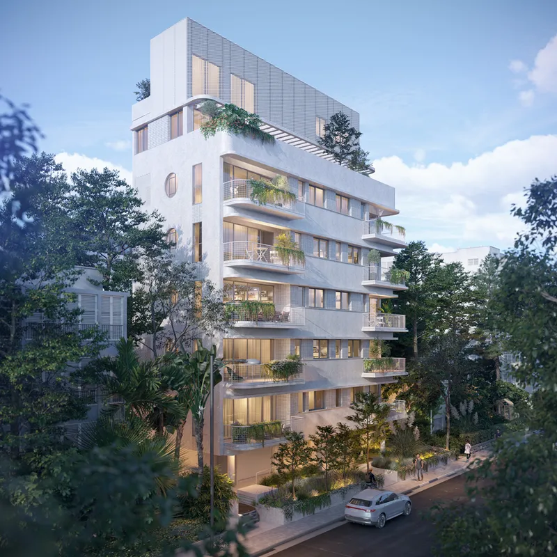 Exterior view of a multi-storey building with windows and balconies.